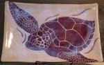 Stoneware platter, sgraffito carved tortoise design