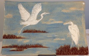 Stoneware platter, sgraffito carved egrets designs
