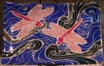 Stoneware platter, sgraffito carved dragonfly design