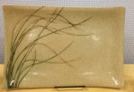 Stoneware platter, sgraffito carved grasses design