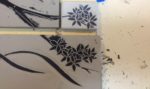 Backsplash tiles, sgraffito carving detail