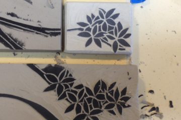 Stoneware tiles, sgraffito carving in progress
