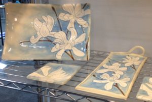 Stoneware tableware, sgraffito carved magnolias design