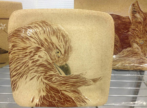 Stoneware plate, sgraffito red tailed hawk