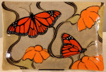 Stoneware platter, sgraffito carved monarch butterflies motif