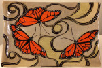 Stoneware platter, sgraffito carved monarch butterflies motif