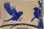 Stoneware platter, sgraffito carved chickadees motif