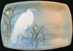 Ceramic platter, sgraffito carved great egret design