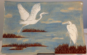 Stoneware platter, sgraffit carved egrets motif
