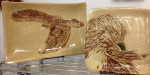 Stoneware platter, sgraffito red tailed hawk