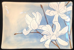 Stoneware platter, sgraffito magnolias design
