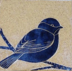Stoneware tile, sgraffito carved chickadee motif