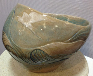Ceramic vessel, sculpted seascape design