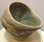 Ceramic vessel, sculpted seascape design