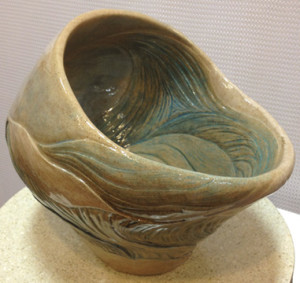 Ceramic vessel, sculpted seascape design