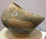 Ceramic vessel, sculpted seascape design