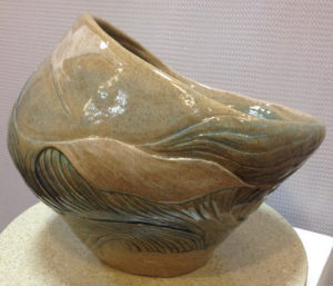 Ceramic vessel, sculpted seascape design