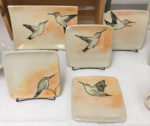 Display of hummingbird plates