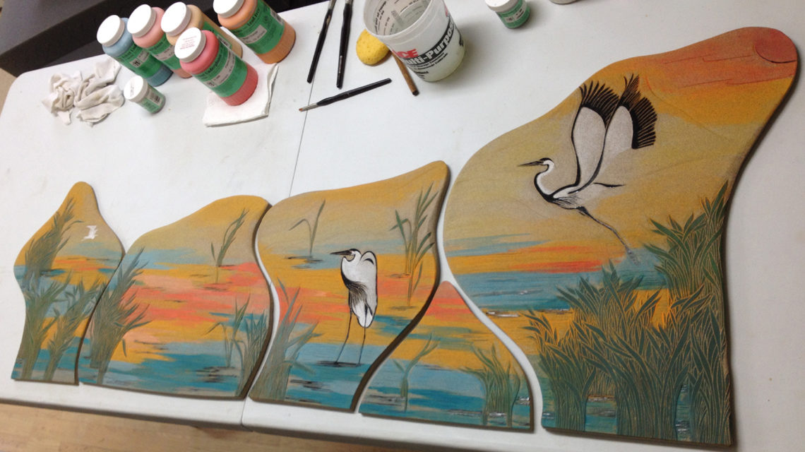 Studio photo; wall tiles work in progress; wetlands motif, herons, grasses