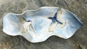 Stoneware bowl, sgraffito carved design of swallows in flight