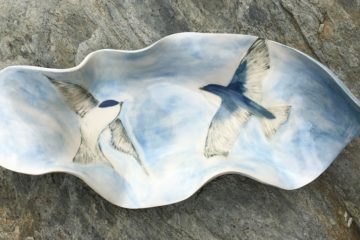 Stoneware bowl, sgraffito carved design of swallows in flight