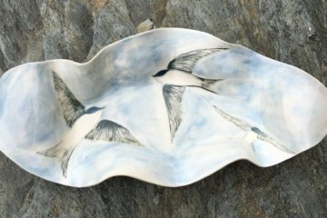 Stoneware bowl, sgraffito carved design of swallows in flight