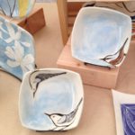 Stoneware bowls, sgraffito carved nuthatch designs