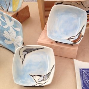 Stoneware bowls, sgraffito carved nuthatch designs