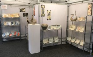 Frog Song Designs booth at Craft Vermont