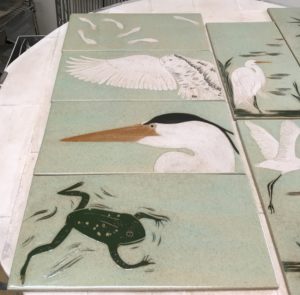 Ceramic tiles, sgraffito carved frog & heron