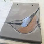 Work in progress, sgraffito nuthatch tile