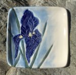 Square stoneware plate, sgraffito carved iris motif