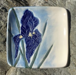 Square stoneware plate, sgraffito carved iris motif