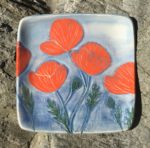 Square stoneware plate, sgraffito carved poppies design