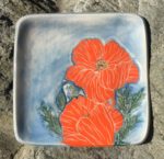 Square stoneware plate, sgraffito carved poppies design
