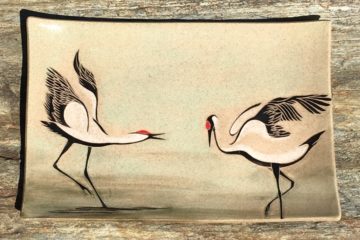 Rectangular platter, sgraffito carved design of dancing cranes