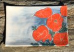 Stoneware platter, sgraffito carved poppies design