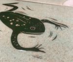 Ceramic tile, sgraffito carved frog design