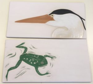 Stoneware tiles, sgraffito carved heron & frog