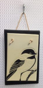 Hanging tile, sgraffito carved chickadee design