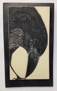 Ceramic tile, sgraffito carved raven design