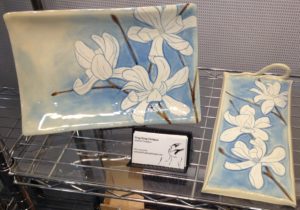 Ceramic platters with magnolia design