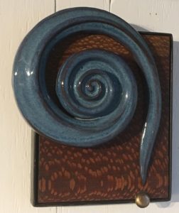 Ceramic wall art on display