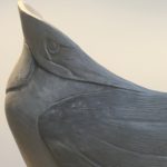 Detail view of a carved bird form