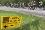 Open Studio roadsign, Killington Stage Race passing