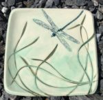 Stoneware plate, sgraffito carved dragonfly and grasses