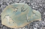 Decorative stoneware tile, swallows in flight