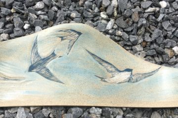 Decorative stoneware tile, swallows motif