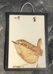 Stoneware tile, sgraffito carved wren design